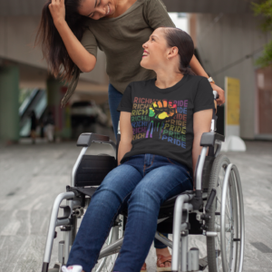 Girl in wheelchair wearing a black Richmond Pride shirt