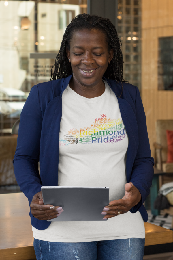 Senior women with her tablet wearing a white t-shirt with the rainbow flag colors on the state of Kentucky .